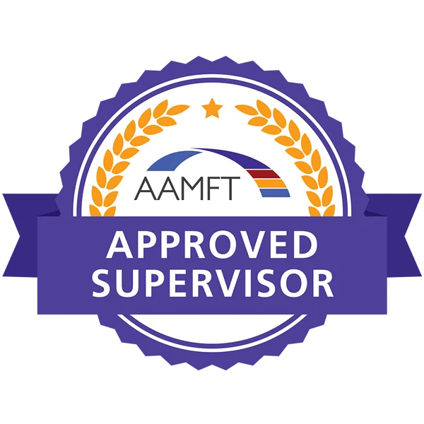 AAMFT Approved Supervisor seal with purple badge, gold laurel wreath, and blue ribbon banner