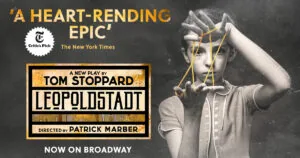 Broadway theater poster for Leopoldstadt by Tom Stoppard, directed by Patrick Marber, with New York Times Critics Pick badge and quote calling it a heart-rending epic